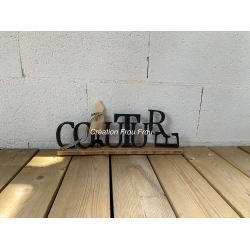 Couture sur support en bois